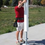 Slide the pergola posts over the post bases